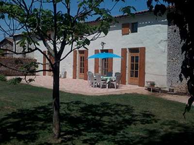 The holiday gite from the garden on a warm October morning